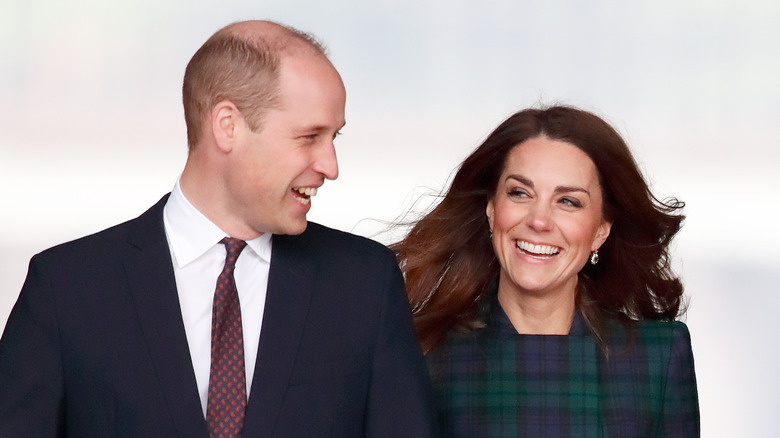 Prince William and Kate Middleton smile during an outing. 