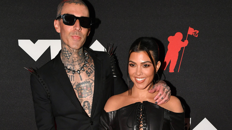 Travis Barker and Kourtney Kardashian, VMA red carpet.