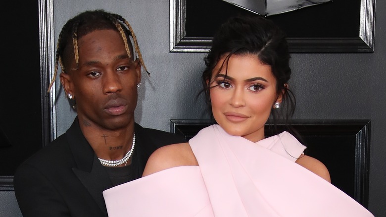 Travis Scott and Kylie Jenner at event