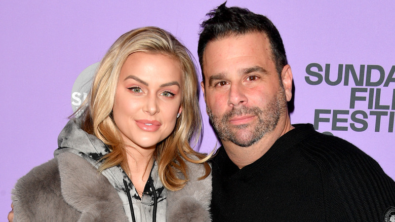 Lala Kent and Randall Emmett pose together at an event