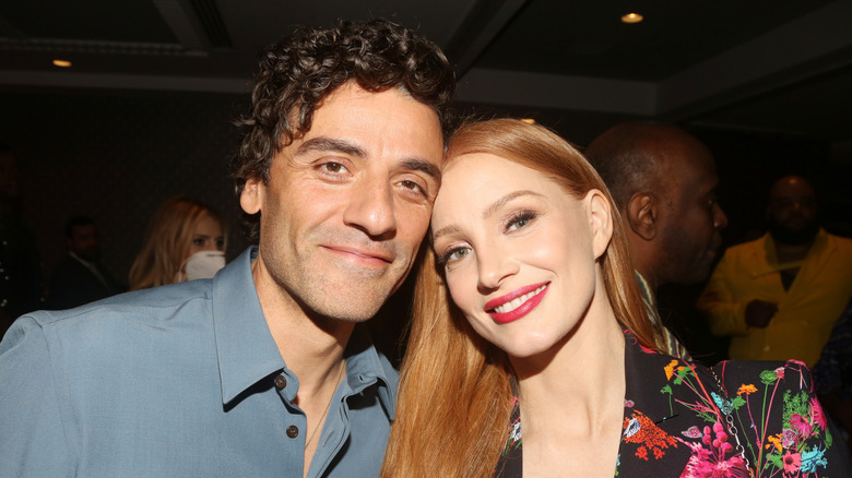 Jessica Chastain and Oscar Isaac smiling