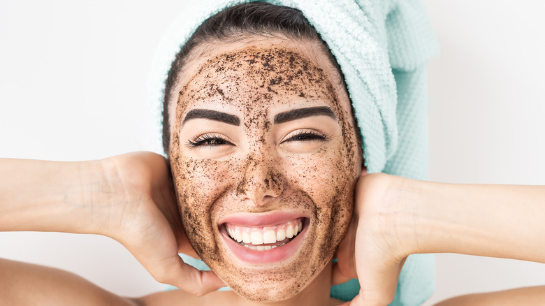 Woman exfoliates