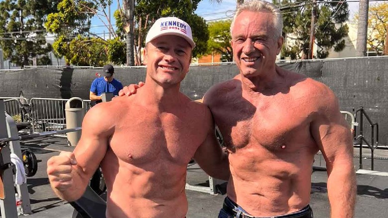 Robert Kennedy Jr. poses shirtless for a photo with a supporter and fellow gym goer