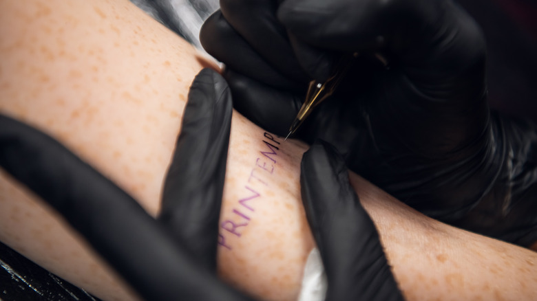 A professional stick-and-poke tattoo needle