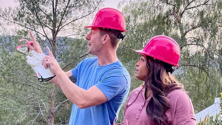 Brian and Mika Kleinschmidt wearing hard hats