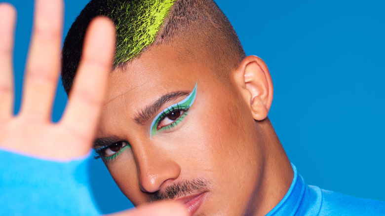 Model wearing blue/green palette 