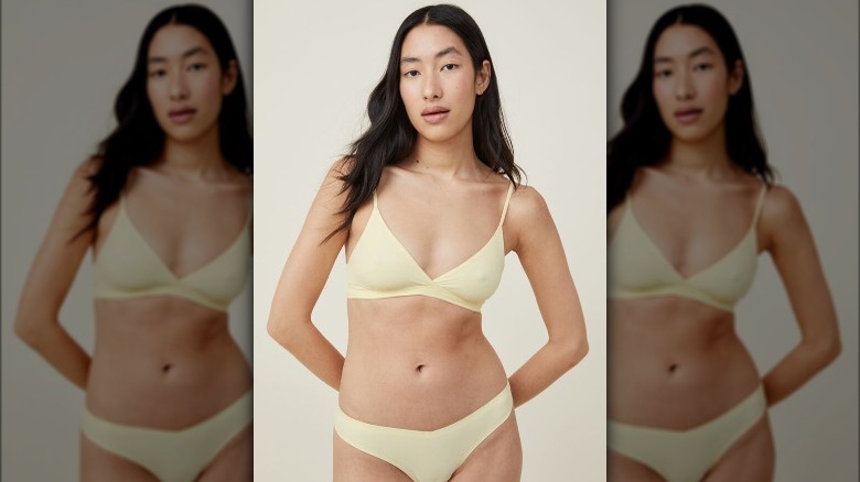 Cotton:On model in triangle bra