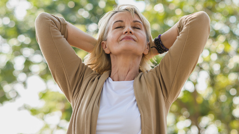 A woman breathing fresh air 