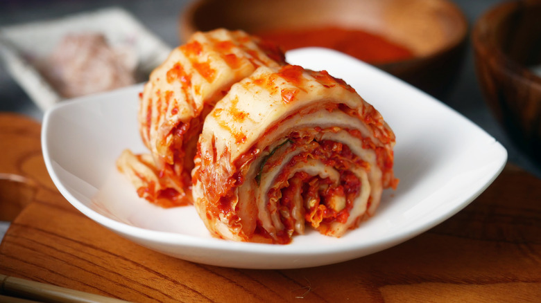 Kimchi rolled on white plate