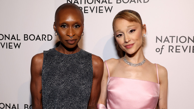 Ariana Grande and Cynthia Erivo posing for photos