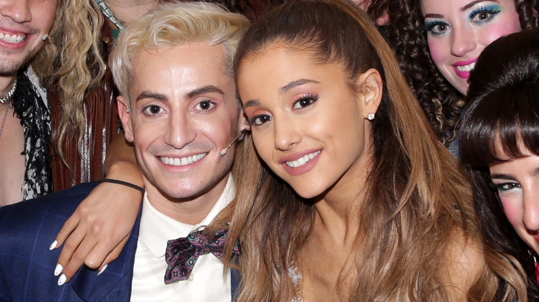 Frankie Grande and Ariana Grande posing backstage at 