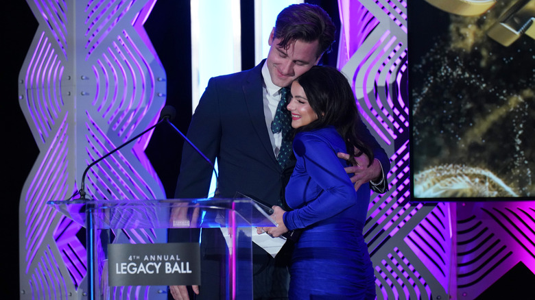 Luke Benward hugging Ariel Winter at the 2024 Legacy Ball