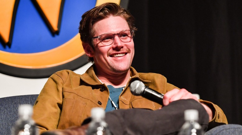 Zach Roerig smiling with microphone