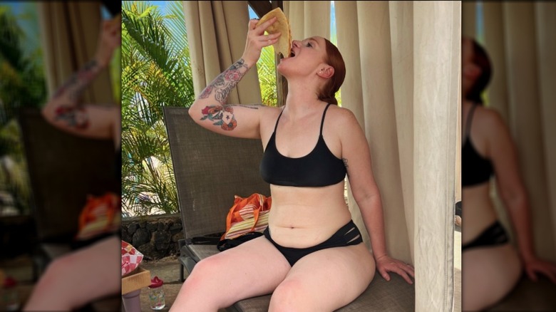 Ashley Elliott eating pizza