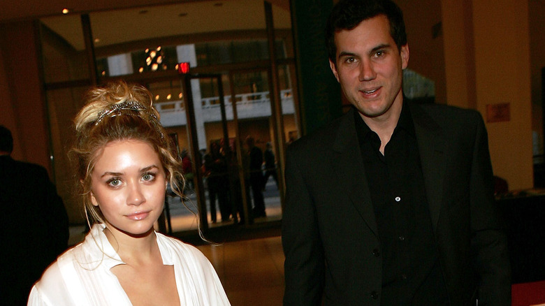 Ashley Olsen and Scott Sartiano pose for a photo