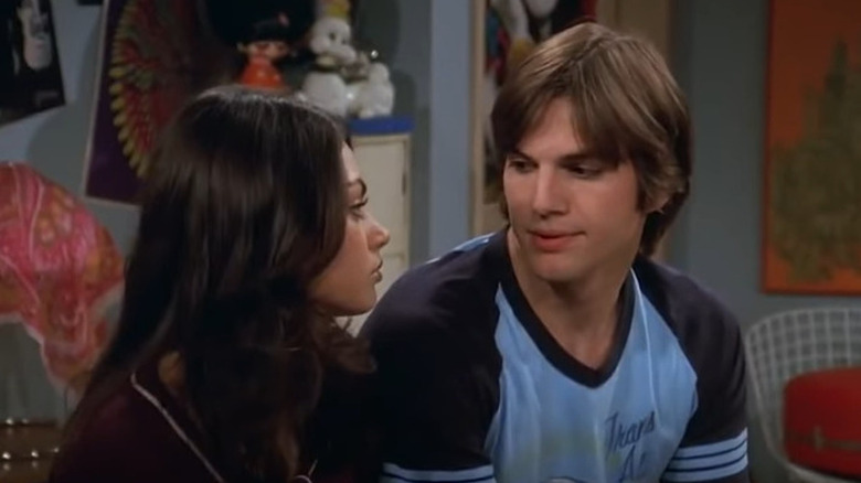 Ashton Kutcher and Mila Kunis on television