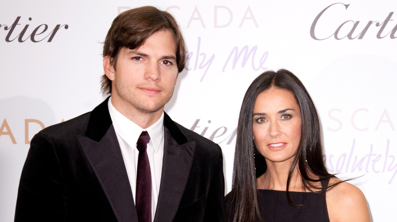 Demi Moore and Ashton Kutcher posing