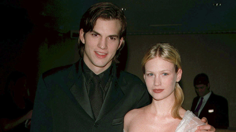 Ashton Kutcher and January Jones smiling