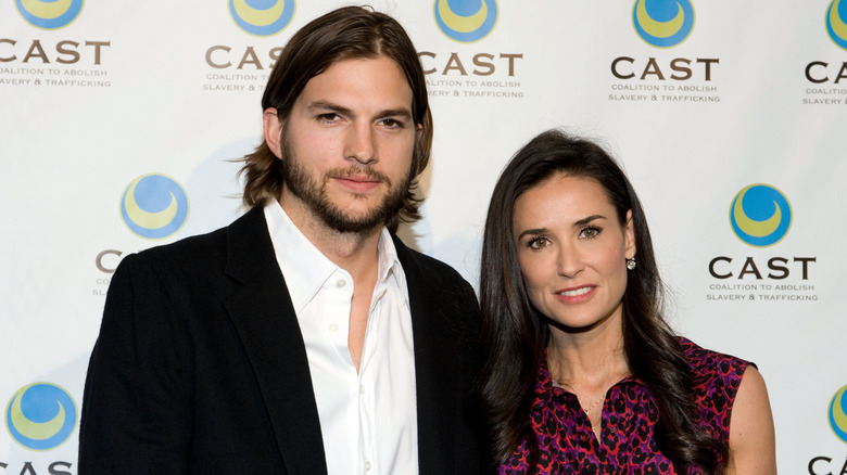 Ashton Kutcher and Demi Moore at a red carpet