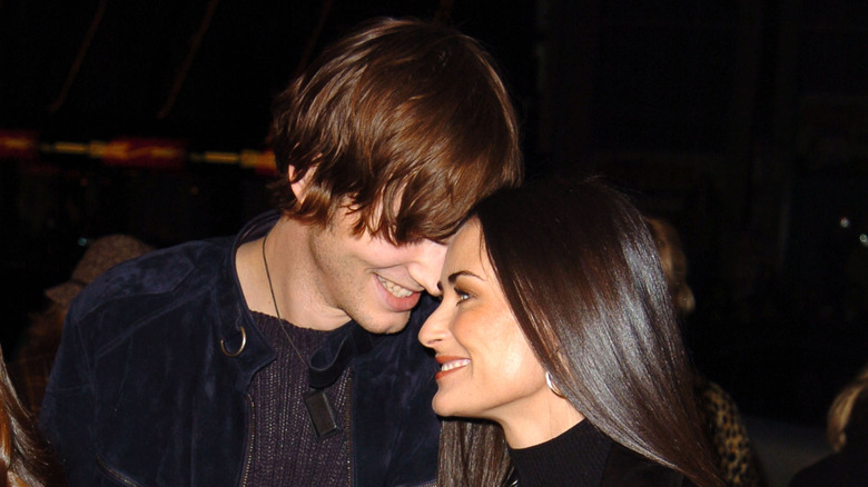 Ashton Kutcher and Demi Moore smiling