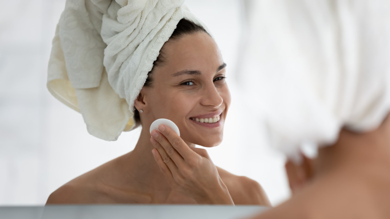 woman using toner