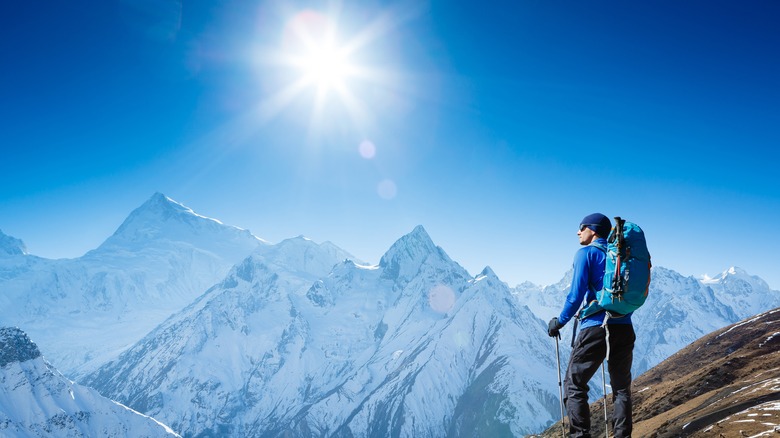 A man backpacking through the Himalayas