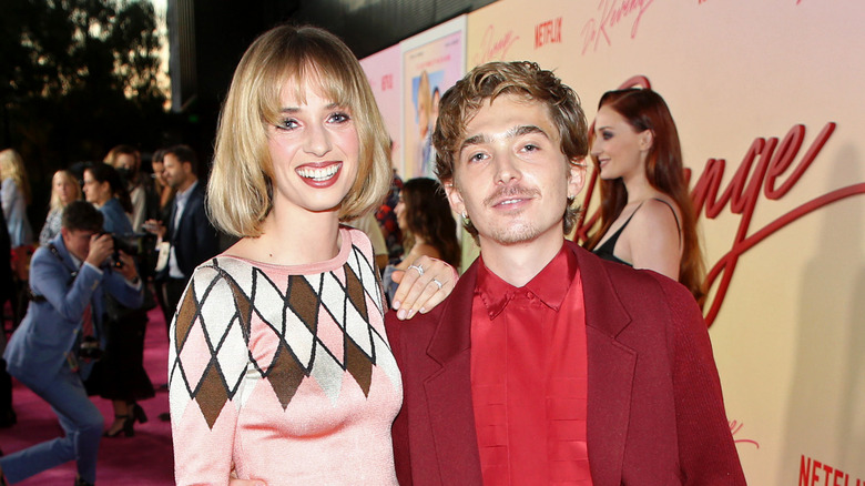 Austin Abrams and Maya Hawke posing 