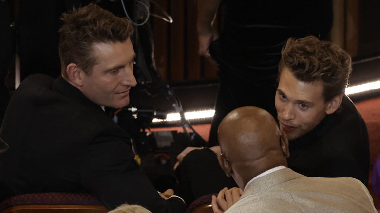 Austin Butler sitting by James Farrell at Oscars