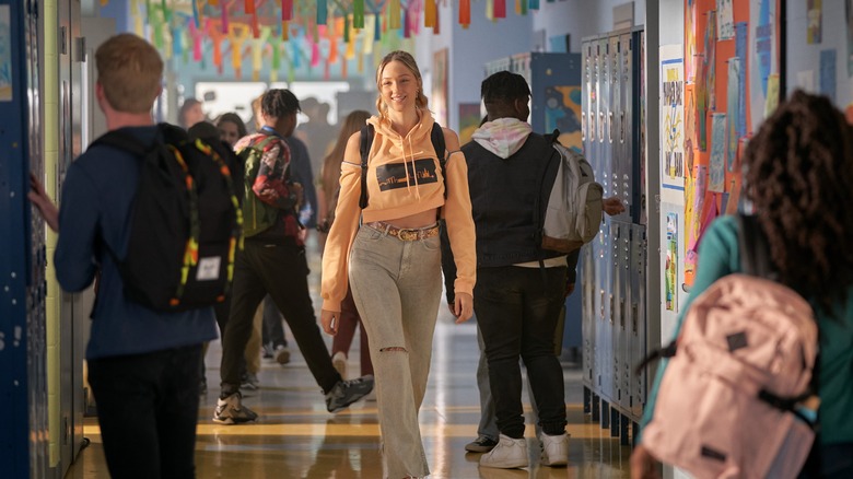 Ava Michelle walking down the hallway in Tall Girl 2