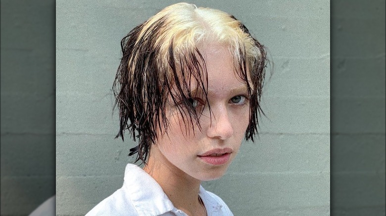 Girl posing with hot roots 