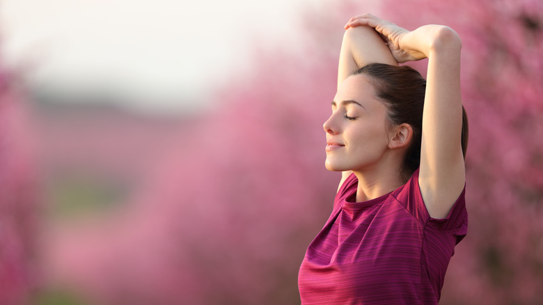 Woman stretching outside