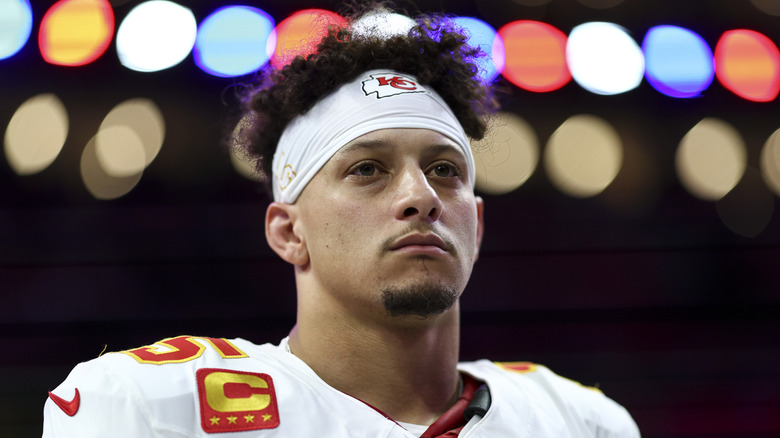 Closeup of Patrick Mahomes looking tearful in Kansas City Chiefs uniform