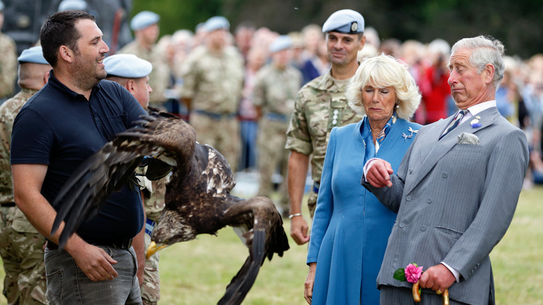 Camilla Parker Bowles and Prince Charles with bald eagle