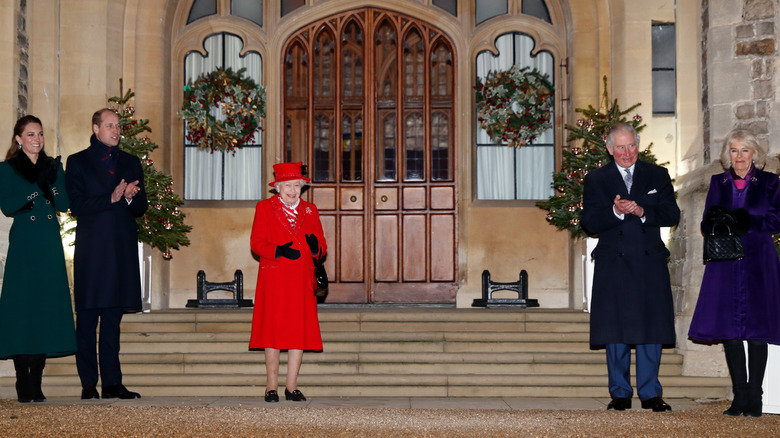 Royal family clapping