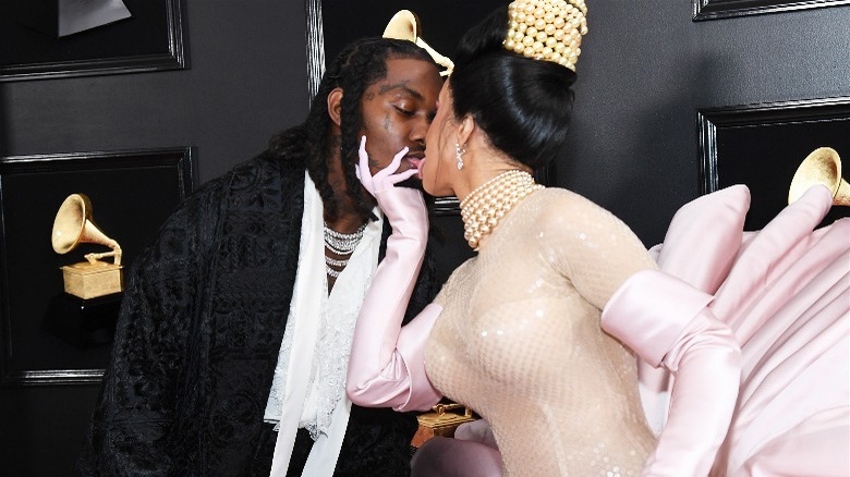 Cardi B and Offset touch tongues