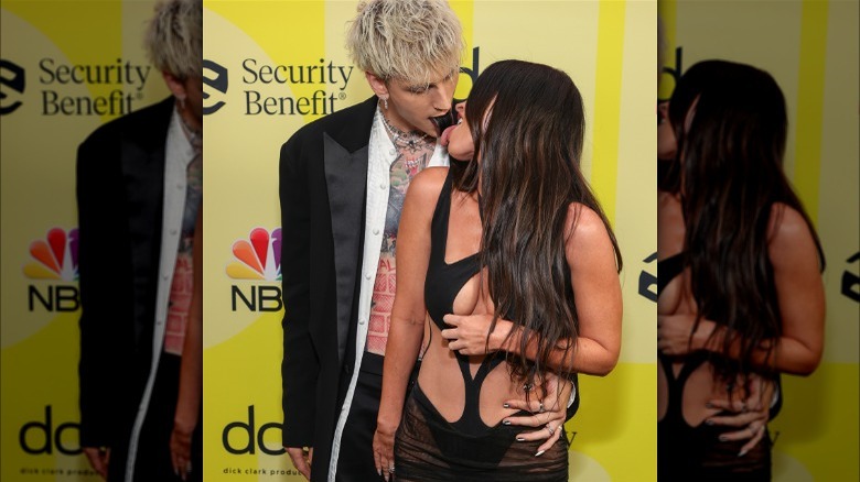 Machine Gun Kelly, Megan Fox touching tongues