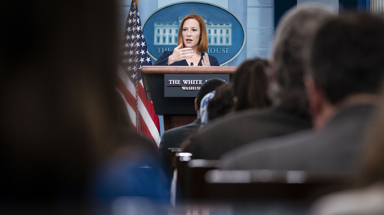 Jen Psaki at podium 