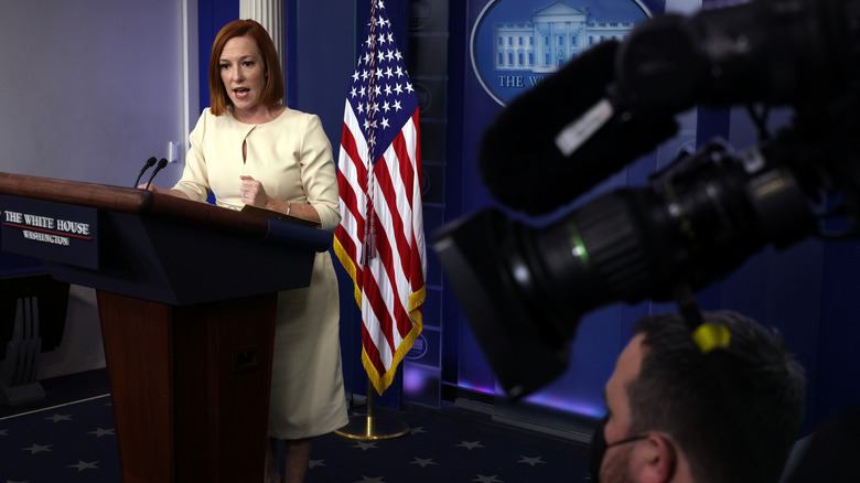 Jen Psaki at podium 