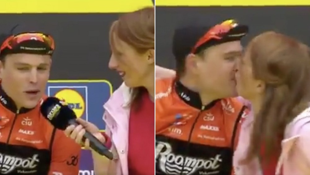 Belgian cyclist kissing reporter