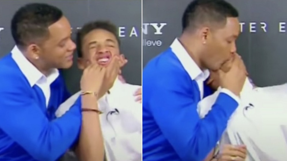 Will Smith kisses his son Jaden Smith