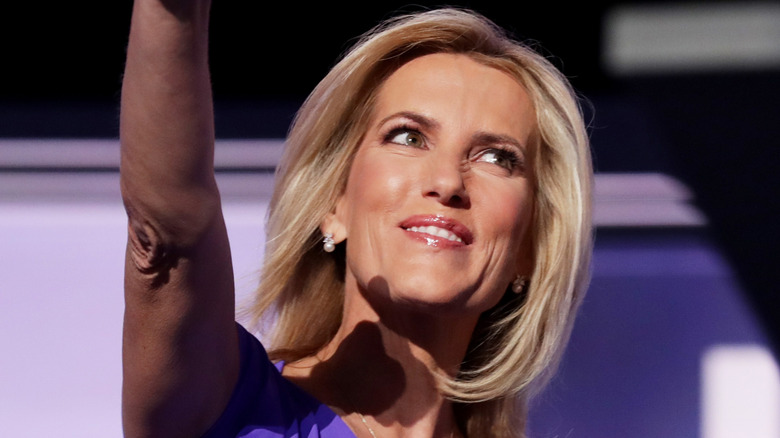 Laura Ingraham raising her arm