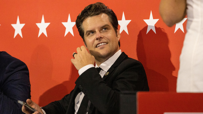 Matt Gaetz smiling and looking up