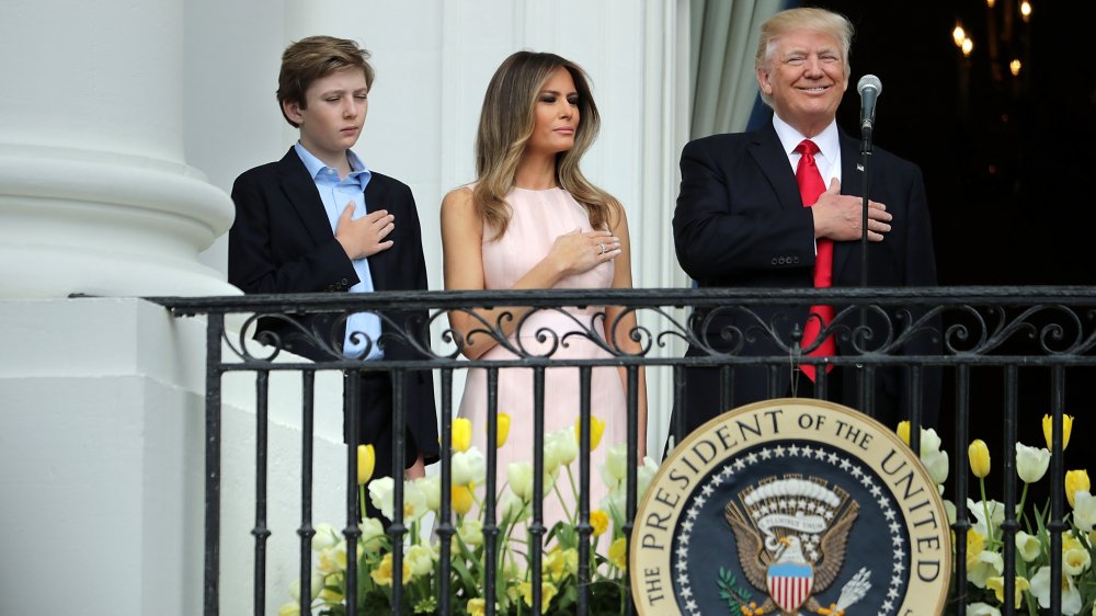 Melania Trump, Barron Trump, and Donald Trump pledging allegiance