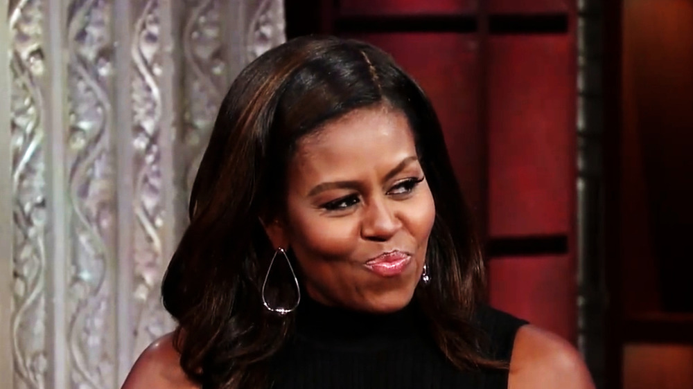 Michelle Obama pursing her lips