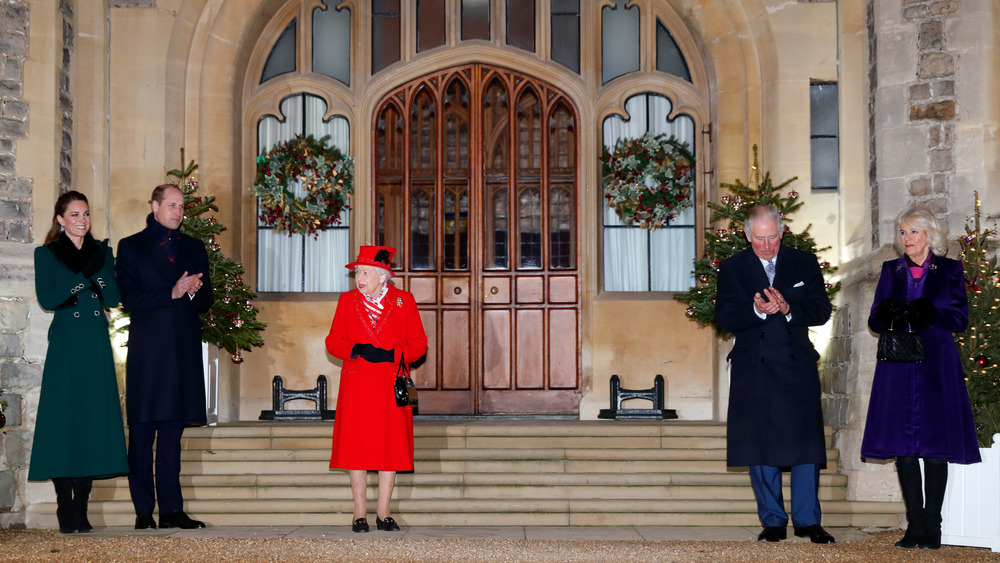 Prince Charles and royal family clapping