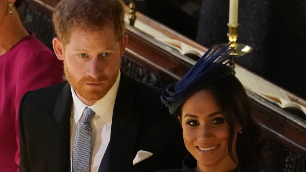 Prince Harry and Meghan Markle at a wedding