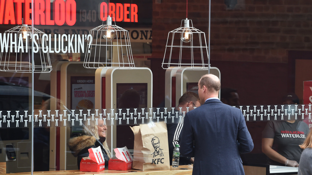 Prince William staring into a KFC