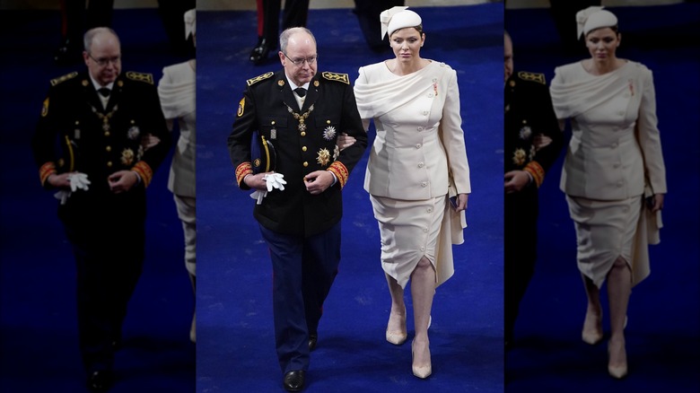 Prince Albert and Princess Charlene walking arm in arm