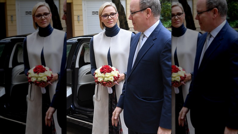 Princess Charlene and Prince Albert exiting a car