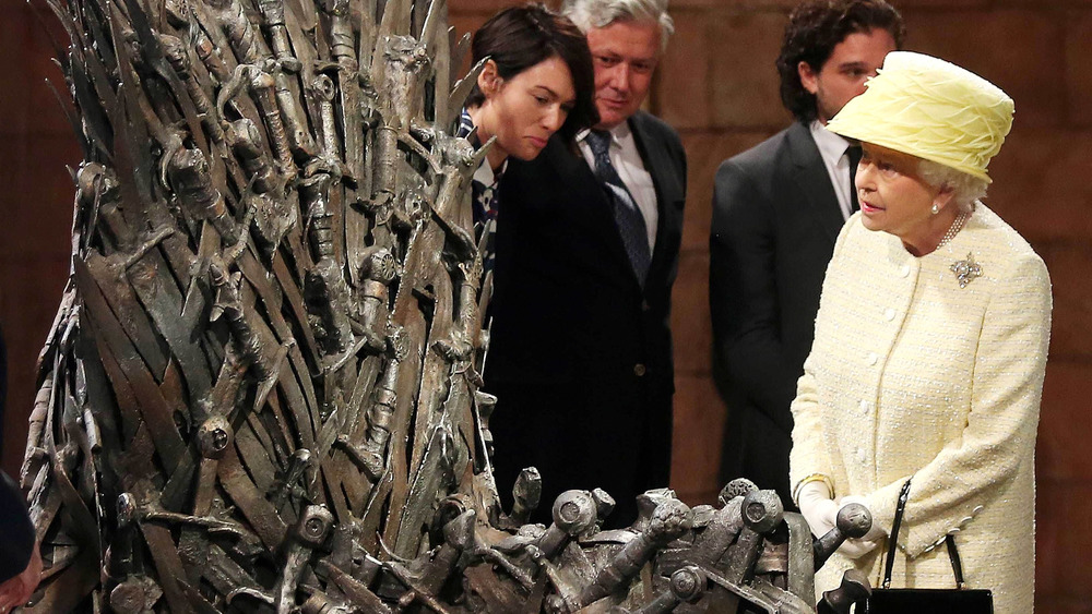 Queen Elizabeth looking at the Iron Throne